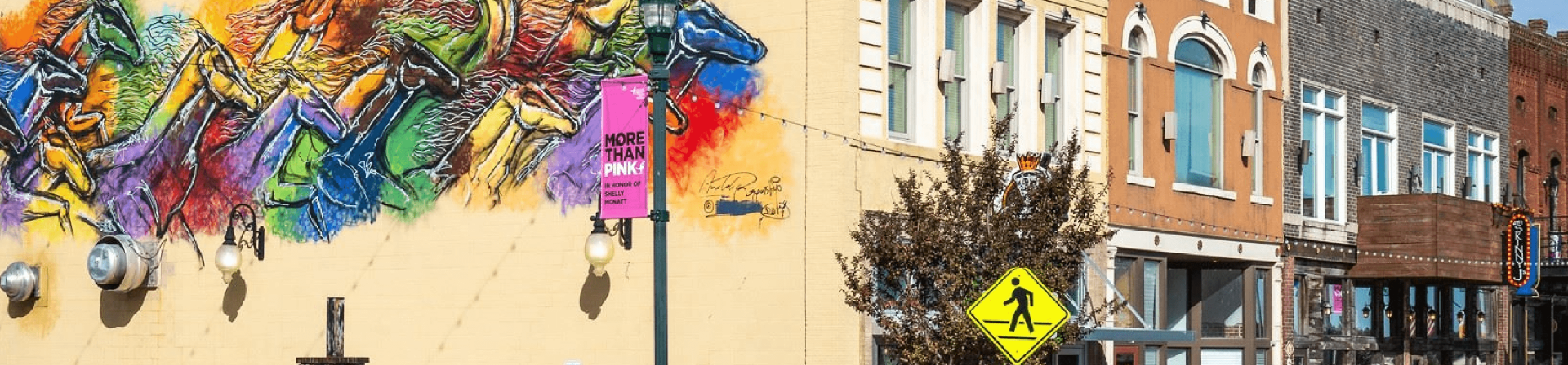 Downtown building with mural on wall