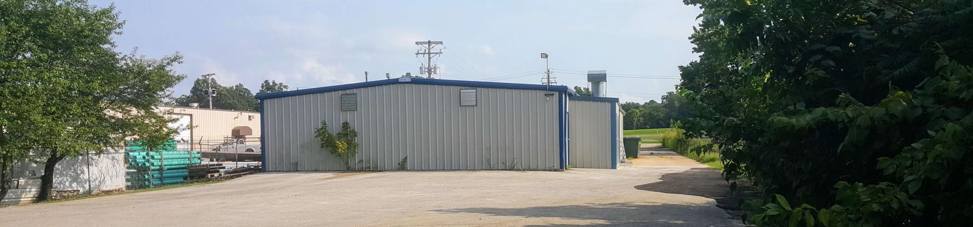 Back Side of NEA Optical Building and Parking Lot